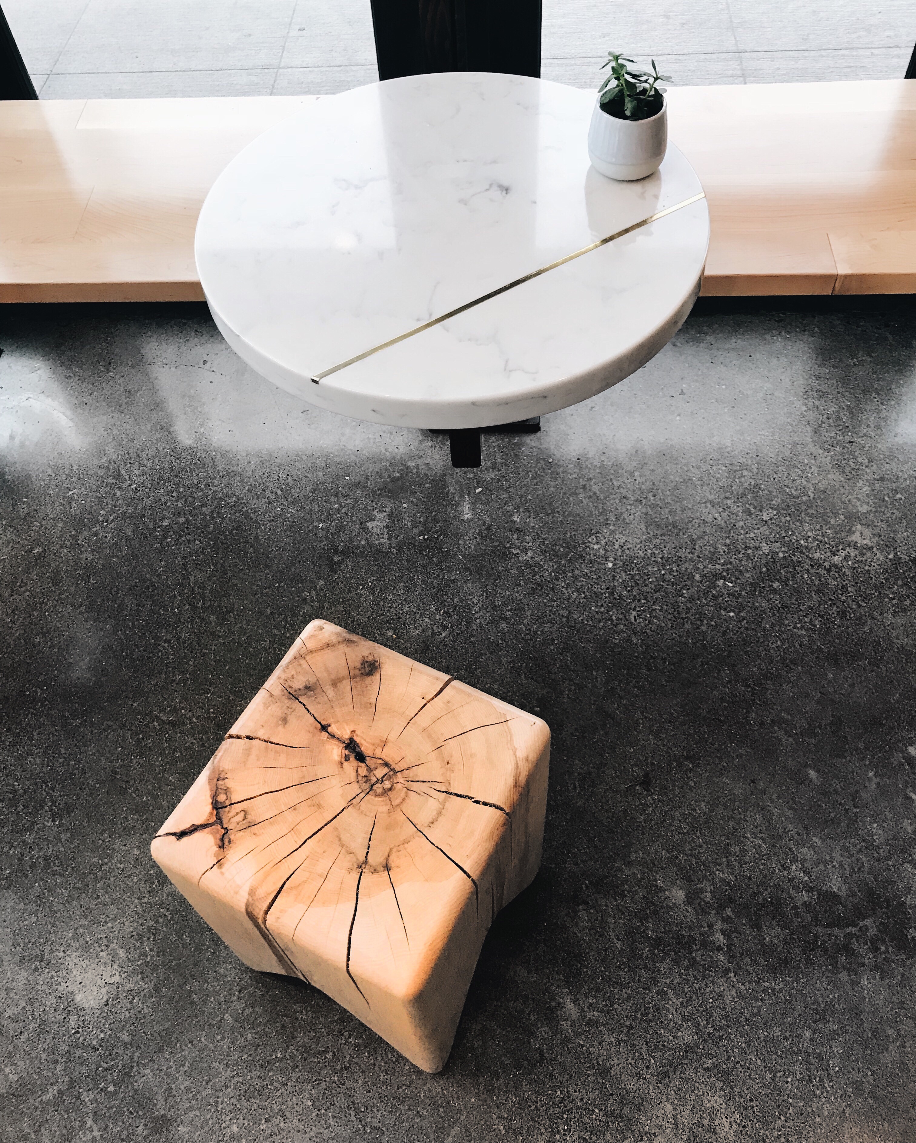 Custom quartz tables and wood stools at Olympia Coffee Roasters | beccarisaluna.com