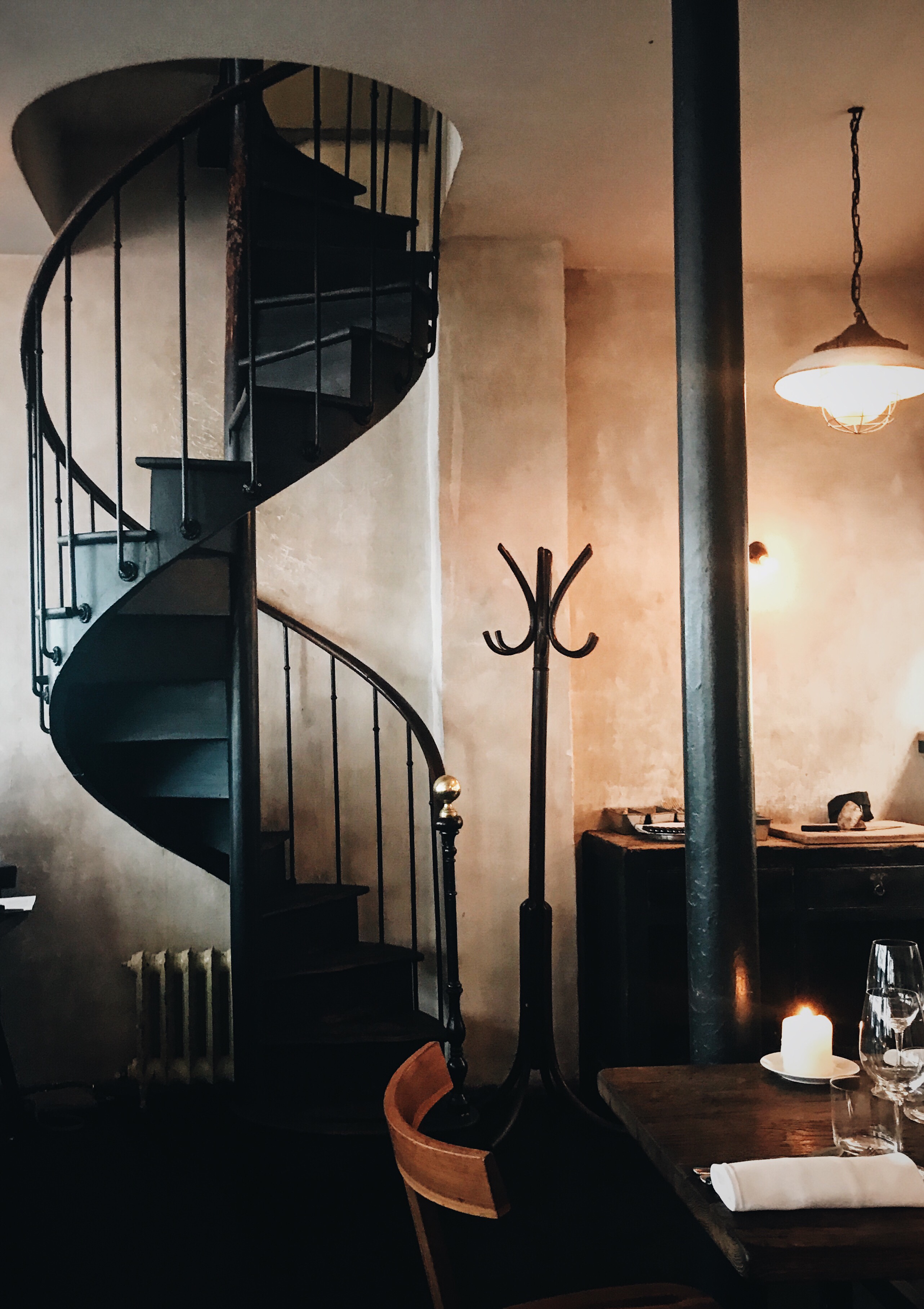 Septime spiral staircase and rustic decor